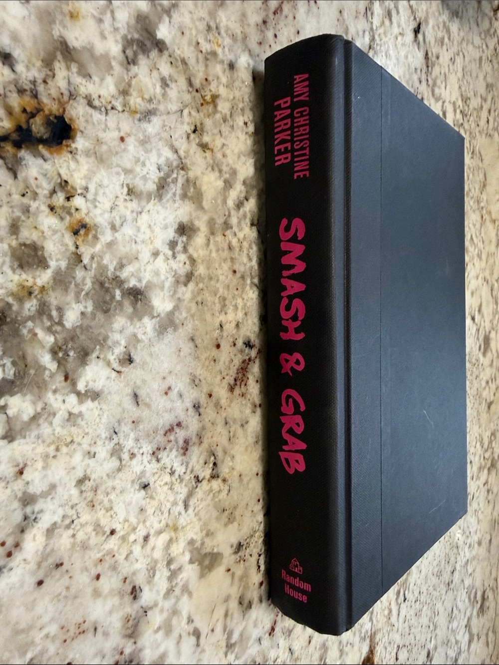 Smash & Grab Hardcover Book with Pink Spine Text